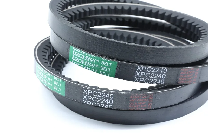 Raw-edge cogged V-belt samples showing the cog profile